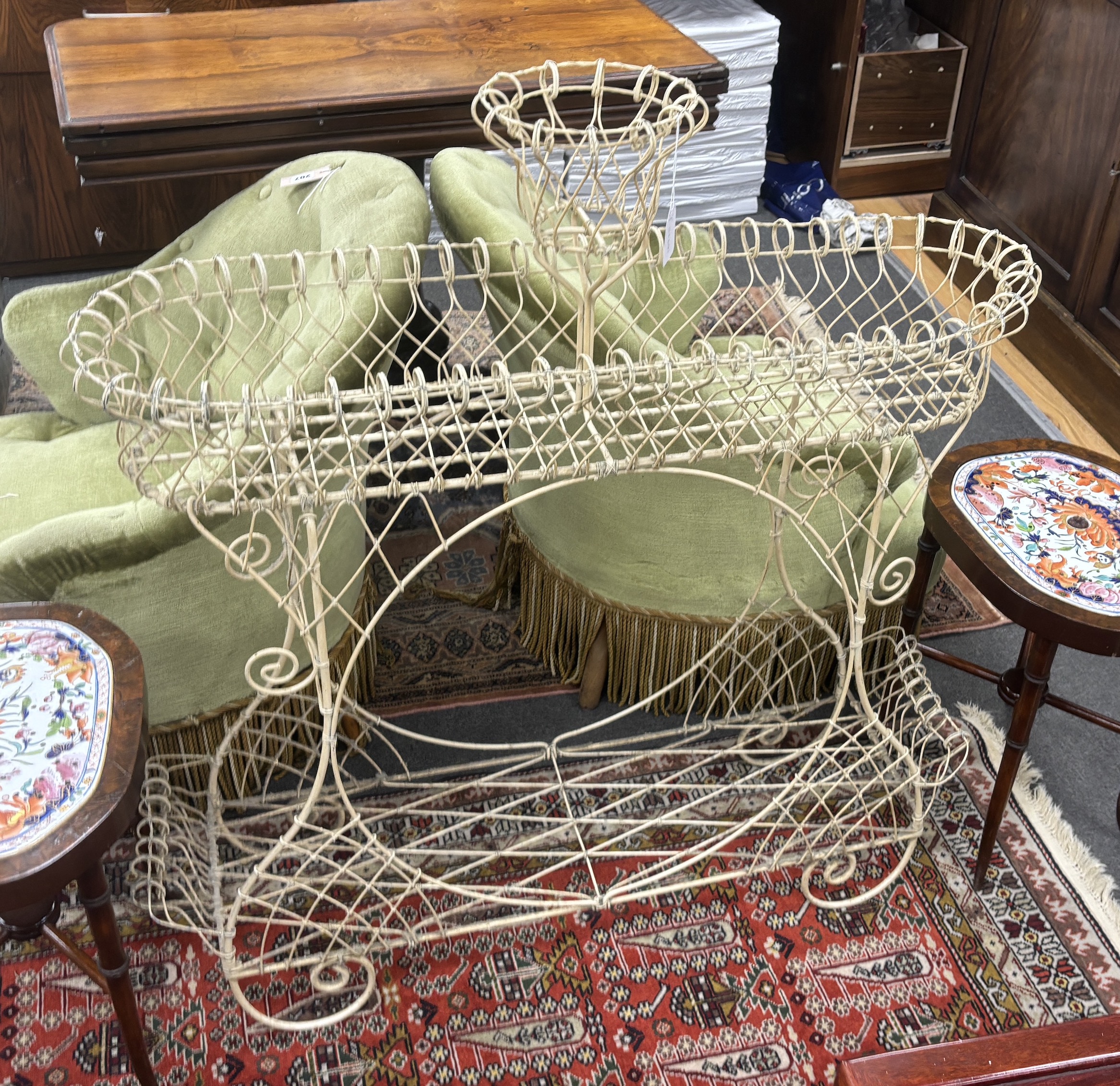 A Victorian style painted wirework pot stand, width 100cm, height 106cm